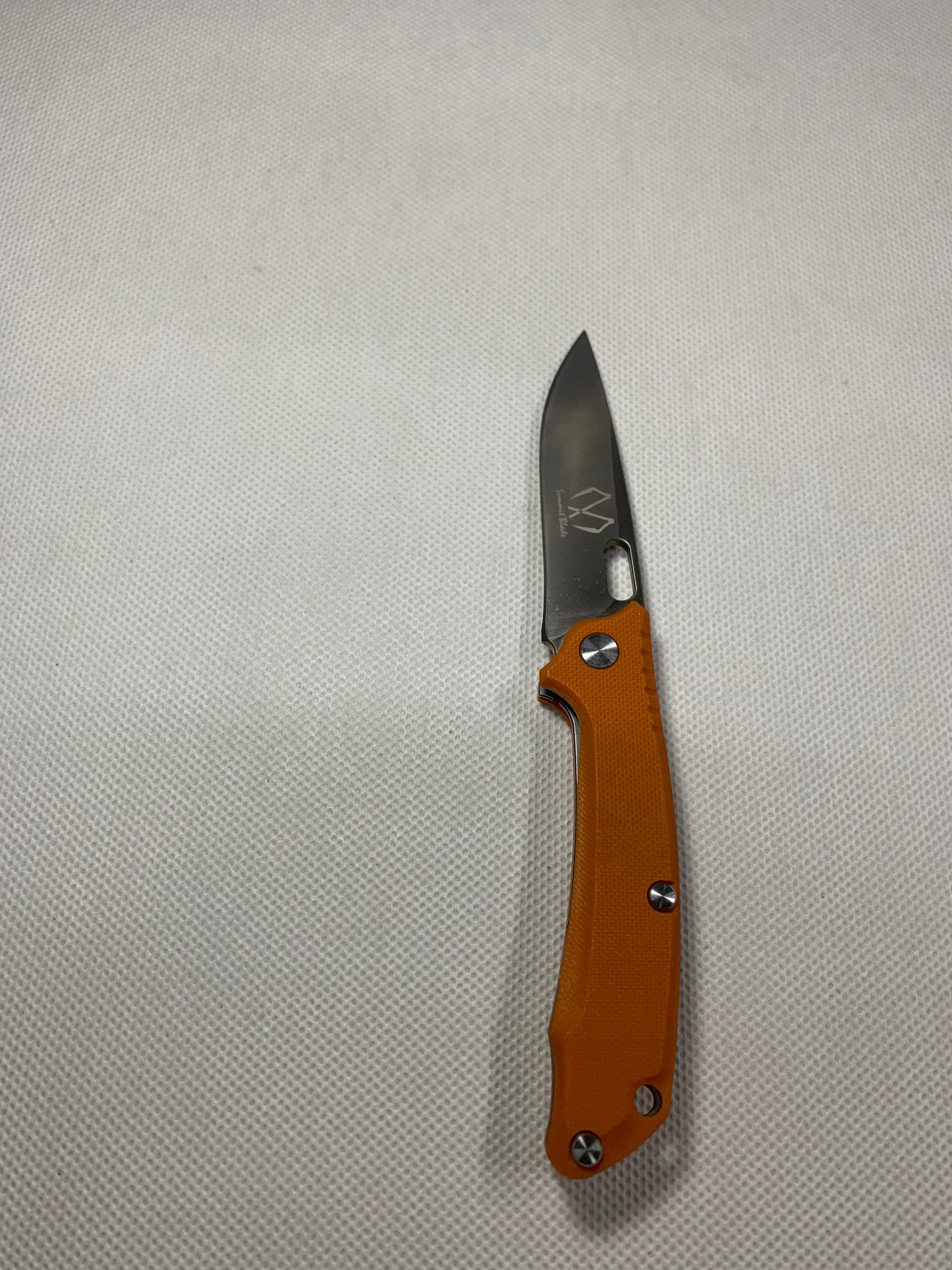 Summit Blade Folding knives A sturdy and durable folding knife, suitable for outdoor and survival use.